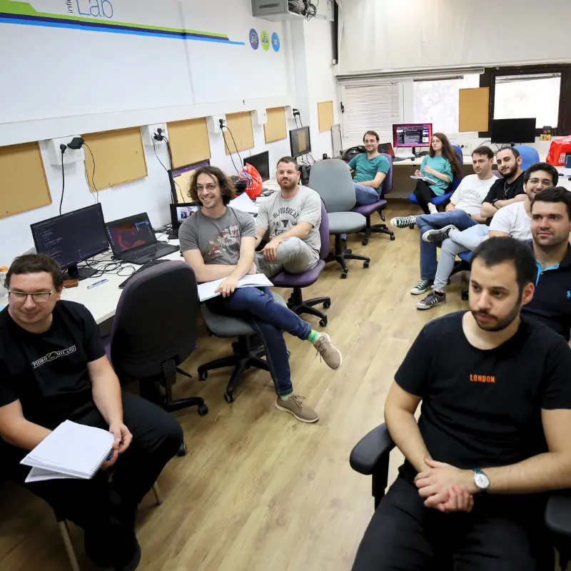 Generative AI Development in Cybersecurity - students working on related projects during hands on training program