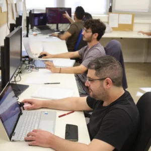 From Physics to Advanced Software Development - students working on related projects during hands on training program