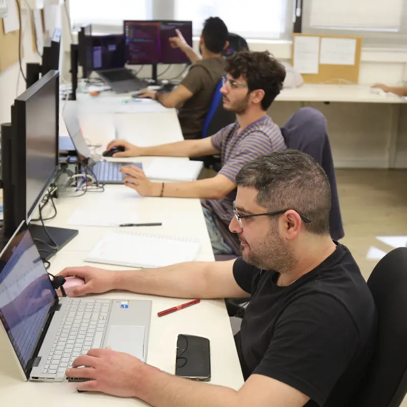 From Physics to Advanced Software Development - students working on related projects during hands on training program